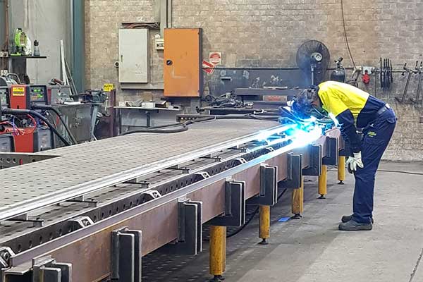 Metal fabrication services including repair and straightening